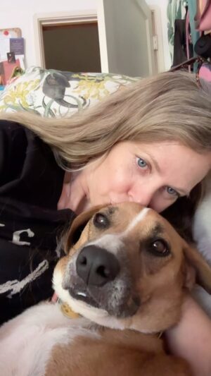 Kristin Bauer Instagram - Do you think Sydney likes this by the look on her face? #hugs #oxytocin #adoptdontshop #dog #mut