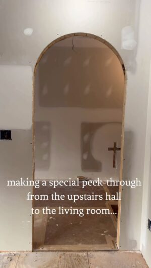 Lauren Liess Instagram - We’ve been working on our personal home for years and all the little the details we planned in the very beginning are finally coming to life.  I got the idea to put a cut-out from the hall to the living room when I saw light do something in a pretty way up there during our initial walk-through of the house over 4 years ago. Super simple to have done and I’m happy to have a little glowing a reminder of our faith in the house 🤍