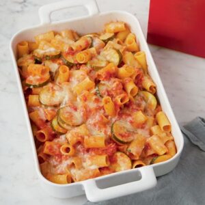 Lidia Bastianich Instagram - Baked Rigatoni and Zucchini. Today you get zucchini year-round, so it’s easy to make this dish for the family at any time of the year. To balance it further, add some protein, such as swordfish, shrimp, crumbled sausages, or shredded chicken breast. You can add as little or as much of each ingredient to this recipe as you want, to satisfy your nutritional preferences and, of course, your taste. Buon Gusto!  Link to video and recipe in my bio. @granapadano  @centofinefoods 
.
.
.
.
.
 #centofinefoods #LidiasRecipes #LidiasItaly #LidiasKitchen  #granapadano  #ItalianFood
