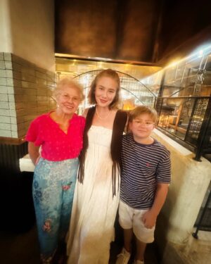 Lynn Collins Instagram - I may have had a rough summer but these two special people had it much worse than me. 

To keep on the track of extreme gratitude this is an appreciation post for my mother Patsy, and my son Asher. 

My mom has lost two children, and I watched her live through the horrible threat of losing another one. She slept on the cot in the hospital room, rubbed my swollen feet with healing oils, held me as I cried bc the pain overwhelmed me, emptied the weird hospital commode we had to use at home, administered my IV antibiotics, made sure I ate, did the laundry, swept the floors, washed the dishes, took out the trash, and cheered for the markers of my recovery. She turned 84 in the midst of this whirlwind. Our relationship experienced radical healing this summer. Another silver lining. 

Asher sweet Asher. iykyk. 
I couldn’t shield him from the reality of the fragility of life. What bravery and courage he displayed every step of this journey. Even now he inspires me with his honesty, as integrating the odd adventure of the summer is still a task. 

Our world has changed, our relationships have deepened, and the present moment has gained a new respect. 

The doctors and nurses were not the only ones who saved my life this July. 

These two angels became my wings. 

🤍

Thank you @themikutashop for the dress 🤍 
Thank you @gwenrestaurant for the gorgeous celebratory meal 🤍