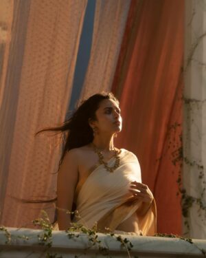 Malvika Nair Instagram - We envisioned Uttara as a character with idealized features—large, expressive eyes, soft and delicate facial contours, and skin that radiates an inner glow. Malvika Nair was the perfect choice to embody the grace, elegance, and timeless beauty of Uttara.

For her attire, we selected a self-checkered, textured cotton mal, reminiscent of the finest cottons of a bygone era. To enhance its authenticity, we incorporated a pure zari border, seamlessly integrated into the fabric, creating the illusion of a sari woven from a single loom.

When it came to the pleating, we drew inspiration from a vintage portrait of Princess Victoria Gowramma (1822-1865), capturing the essence of royal heritage in the draping style.

For the jewelry, we collaborated with Bajrang Jewellers, carefully curating from their exquisite collection of vintage pieces.

In the end, Uttara emerged as an embodiment of both earthly beauty and divine grace, a true reflection of our vision.

@vyjayanthimovies @nag_ashwin @swapnaduttchalasani @priyankacdutt @lbajrangpershadjewellers @kalki2898ad @sindhuri_bathula @abhistylez @sahithip_ @saikumar__kakkerla