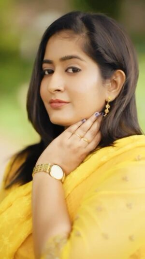 Megha Mathew Instagram - If I know what love is, it is because of you. 💛❤️

 👗 @the_drape_studio @jittasiju 

📷@jith_in_sunny_ .

 💄 @alva_makeover @sijo.mathew_ 

#reels #reelsinstagram #loveislove #yellow #instalike #happiness #yellow