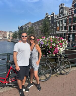Melina Kanakaredes Instagram - Hello Amsterdam! Love my new shoes😂- and the views! 🚲🇳🇱💗🥂🙌🏻♥️
