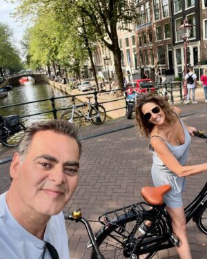 Melina Kanakaredes Instagram - Hello Amsterdam! Love my new shoes😂- and the views! 🚲🇳🇱💗🥂🙌🏻♥️