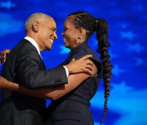 Michaela Angela Davis Instagram - “and her waist-length power braids, her hair having functioned as a sort of declaration of independence after leaving the East Wing. When her husband, Barack Obama, became the first Black president, she hadn’t felt the American people were ready for natural Black hair or braids in a First Lady” @vvfriedman for @nytimes  @michelleobama image exemplified the power of Black hair as symbol of struggle, imagination   liberation. #TheHairTales #PassTheCROWN (please tag hair stylist) ps her “power suit” was designed by @monsemaison Dominican   Asian American design house.