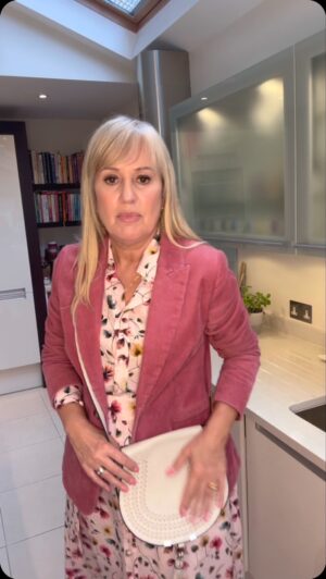 Nicki Chapman Instagram - Transition pieces… or in other words eeking out our Summer/Autumn wardrobe 🍁Wore this last week doing some book promo & loved the combo… 

An autumnal pinky dress with a dusty cord jacket. Open toes shoes may be put on hold - replaced by boots if the drizzle continues but rain won’t stop play ☔️🏏

Anyone else refusing to put away those dresses? 

Jacket @boden_clothing 
Dress @reallywildclothing 
Shoes @esskashoes