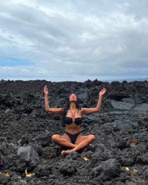Nicole Scherzinger Instagram - Seated on ancient lava, I connect with the roots of my ancestors—embracing a legacy etched in volcanic stone and timeless heritage. 🌋