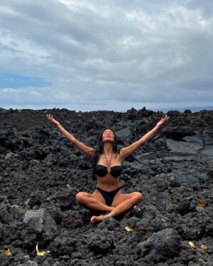 Nicole Scherzinger Instagram - Seated on ancient lava, I connect with the roots of my ancestors—embracing a legacy etched in volcanic stone and timeless heritage. 🌋