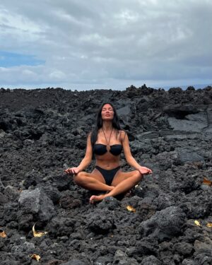 Nicole Scherzinger Instagram - Seated on ancient lava, I connect with the roots of my ancestors—embracing a legacy etched in volcanic stone and timeless heritage. 🌋