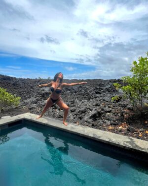 Nicole Scherzinger Instagram - Seated on ancient lava, I connect with the roots of my ancestors—embracing a legacy etched in volcanic stone and timeless heritage. 🌋