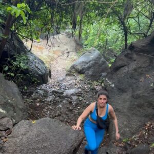 Nimrat Kaur Instagram - Monsoons main ghats pe trek nahin kiya toh kya kiyaaa??!!! 🦋⛰️🍄🌳🪻🌦️🐶🦀 

I’m no expert, I trek because it’s a long time love-affair but reading about some recent trekking tragedies made me want to share some mini pointers. 
🦭 Please ensure you ALWAYS sit down for pictures if you’re in flowing water or high up somewhere too close to a cliff. 
🐾 Super basic but MOST important to take your next step once the previous one is steady. 
🪨 Selfies and videos ONLY when you’re standing/walking on dry rocks/even forest floor. Even with the best of trekking shoes and gear, there’s lots of loose mud and super slippery rocks so PLEASE don’t be in a rush. 
🍄 Try to wear BRIGHT colours, or carry some colourful element, makes it easier for rescuers if you don’t camouflage with the forest incase God forbid there’s a fall and you’re injured. Going deep into nature comes with equal amounts of thrill and responsibility…🫶🏼

Baaki ab ghats par garmi bauhaut badh rahee hai, kaafee photos main smiling outside dying inside waala scene tha…😵‍💫🥵 
So jaldi plan banaao, Sahyadri ki khulee hawaa khao!! 

#monsoontrek #wildheart #nocitygirl #naturelover #BharatKiNimrat