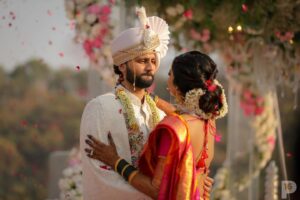 Pooja Sawant Instagram - Six months ago, Sid and I embarked on this journey together, and every day has been brighter since. We are deeply grateful for the blessings and the immense love we’ve received from all of you. ♥️🧿🌸🥰

Photography @p16studios 
Sid’s outfit @shiledar_ethnics 
नऊवारी साडी @narayaniofficial_ 
Mehendi by @tejal_henna_art 
Venue @breezebanquets 
Make up @vrushti_harkare 
Hair @devendra.pushpa 
Varmala @jewellery_by_siddhi 
Wedding planner @bhagatamol 
Wedding management @a3eventsandmedia