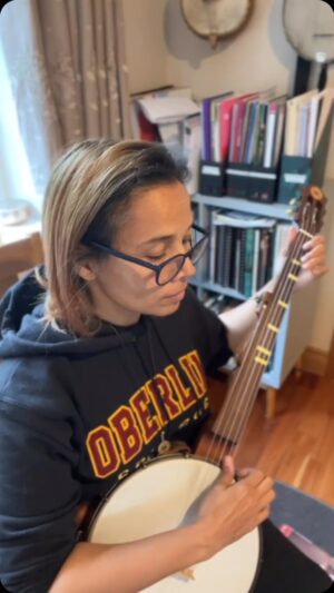 Rhiannon Giddens Instagram - Many of the techniques used for an early style banjo such as the one I hold (1858 Levi Brown replica by Jim Hartel) in large part died out as the ‘stroke’ style favored in these tunes (which itself was a descendent of West African techniques on ancestral lute type instruments) evolved into the ‘frailing’ or ‘clawhammer’ so well known and loved in old time music.  In this piece, Butler’s Jig from Frank Converse’s banjo tutor of 1865 (tab’d by Joseph Weidlich), you can see the thumb technique that really contributes to the rolling feel of this tune.  Here’s a work in progress.