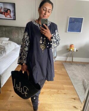 Saira Khan Instagram - I can do modest dressing too 😉. The traditional Shalwaar Kameez - never wore them out as a kid growing up in the 80’s  90’s - I was so embarrassed of being different - also didn’t want to attract unnecessary racist remarks that were rampant at that time. 

Now I have no problem at all. Our country has changed, so much cross cultural adoption - wearing a long top  with trousers  not seen as “weird”. 

When I visit my mum, she much prefers seeing me dressed in traditional South Asian clothes - so out of respect I leave my skimpy stuff at home and bring out my beautiful modest clothes to please her. ❤️

We’ve come a long way in being tolerant …. Lots more progress to make, but let’s celebrate that we are moving forward in the right direction. I have no problem wearing my shalwaar  kameez for the whole world to see - I wear it with pride. People come up to me now to say how pretty it is and not “ oi fu*k off to your own country”

Positive Vibes only and I love that now being “different” is celebrated. ❤️❤️

This outfit from @khaadi