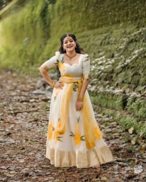 Saniya Babu Instagram - "Celebrating tradition, prosperity, and togetherness this Onam season with love."😍 

Model @saniya_babu_official 
Photography @weddingstoriesphotography
Powerd by @mr_k.eventmanagement
Coordinator @vishnu_thilakan_ 
Mua @magic_beauty_makeover_hub 
Costume @rui__avenue
Credits @actressinsta