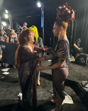 Sasha Colby Instagram - your favorite drag queens favorite @vmas !! @mtv 

such a joy to introduce my daughter for her first of many VMAs performances to come✨ @chappellroan 
I am so proud of you
you are truly an unstoppable force of nature!

wearing @csiriano 
mug @mugopus 
hair @shontellesparkles