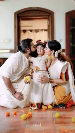 Sruthi Lakshmi Instagram - Sruthi Lakshmi graces us in our off-white saree with multicolors, a masterpiece of understated elegance with its delicate detailing and timeless appeal. 🤍

The child Minsara shines in our vibrant multicolored pattupavada, adding a splash of joyful tradition to the family ensemble. 

Completing the look, the Kathakali hand-painted shirt and dhothi embody the rich cultural heritage with stunning artistry and craftsmanship. 

Swipe to admire these elegant outfits and see how Byhands brings tradition to life with a modern twist. Embrace the beauty of handcrafted fashion and create unforgettable memories with us.

In frame - @lakshmi.sruthi @avin_anto & Our Cute Angel ( Minsara Robin) @sreelayajeeva 
Shots and Cuts - @_raylightsphotography_ 
MUA - @divyas_makeover_

Explore more through the link in our bio.

#Byhands #FamilyElegance #OffWhiteSaree #Pattupavada #KathakaliArt #EthnicWear #TraditionalFashion #HandcraftedBeauty #FestiveWear #TimelessTradition