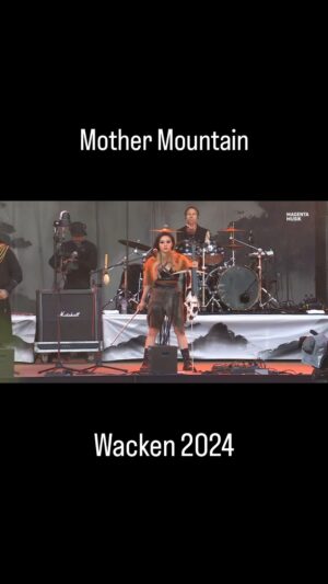 Tina Guo Instagram - Mother Mountain ⛰️ 
Live today at @wackenopenair.official 
Full video on MagentaMusik.de

BAND
@tinaguo 🎻
@voodookungfubandofficial 🎤 
@zulll 🎤
@johnhuldt 🎸 
@kfir_melamed_ 🎸
@takuhirano 🪘 
@frank_klepacki 🥁

FOH @troy_kt_choi 
Tech @itsurbud 
PM @wedgebranon 
TM @dangerdirk77