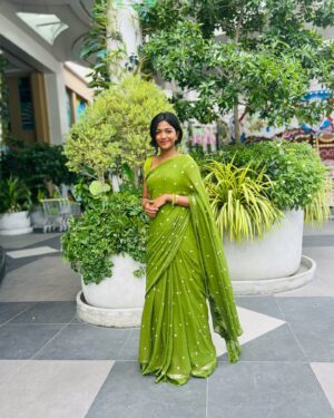 Amala Shaji Instagram - 💚 #amalashaji 
Saree 💚 @hashtag.the.saree.store_
📷 @shahi_official