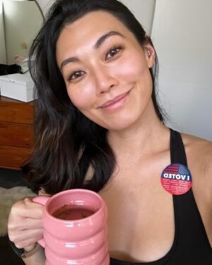 Catherine Haena Kim Instagram - This morning, with her… 💃🏻☕️

I’ve never been early to anything in my life. Seemed like a good time to start. I’m proud to be American. Just reminding you that your voice matters and you matter. ❤️🤍💙 #vote