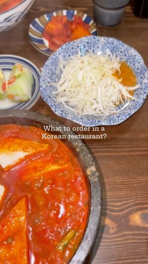Dipshi Blessy Instagram - What to eat in a Korean restaurant and make it worth it! 

I love Korean food and this is what I order for a happy day, a sad day, a celebration or a regret. It’s my go to food. And I love introducing it to people I love. Here we go! 

Quick tip : don’t order two main course! Ask for an extra bowl of rice and the share the main course! thank me later! 

Go slow on the side dishes! And most restaurants refill the side dish if you finish them up. So feel free to ask for more. 

If the side dish doesnt  have kimchi try making a request, because raw kimchi is a trip on its own. However the jigae still comes with cooked kimchi so no worries. 

You can choose veg or non veg and and it comes with your choice of meat. So it caters to all. 

Location : @another__kitchen, Adyar, Chennai. 

#koreanfood #saruanddipshi