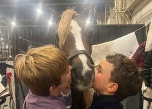 Georgina Bloomberg Instagram - Grateful for this kid and that we get to share a passion for riding, competing, and a deep love for the horses and ponies in our barn. Watching him compete at the @panationalhs this fall was one of the proudest moments I have ever felt as a mother. Not just because of the long history and many incredible memories that show provided me growing up, but also because I know the dedication and hard work it takes to get there, and the courage a kid must have to ride into that arena. Looking back on the fall, that weekend stands out to me as one that made me realize how lucky I am to have this boy in my life, and to get to go through this crazy world with him by my side.