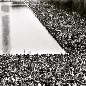 Isabel Wilkerson Instagram - Earlier this year, out of the blue, I received a most unusual query about the cover of Caste — and its landmark photo of hundreds of real-life people from all walks of life. 
A woman in California, Linda Sokolnicki, reached out wanting to know where the photo was taken because she saw her father’s face in it. 
The photo shows some of the quarter million people gathered at the 1963 March on Washington where MLK delivered his “I Have a Dream” speech.
I asked her which man was her father, and she sent me an image of the book with a circle around a man with a heart-shaped face in a priest’s collar.  She said her father, Gene Curry, was a retired Episcopal priest in Michigan, a gentle and humble man who was up in years now at 88 and that his health and memory were not what they once were. 

The discovery began with his wife, Ruth. 

A friend of hers, a principal, had told her that “if I only read one book this year, this is the one I should select.” So Ruth ordered Caste. “When I got it, I saw Gene‘s picture on the cover. That is how it all started.” 
Rev. Curry sent a group text to his children about being on the cover. The daughter ordered the book and immediately spotted him. Her husband happened to hear an interview of mine and told her, “I just heard this interview, and I’m thinking about getting this book called Caste.” 
Linda said, “That’s the book I was telling you about with my Dad on the cover!”
Gene Curry, born in 1936, worked as an engineer and served as a priest at a church in Detroit, whose rectory doors were always open to the poor. When the first black residents moved to their block, the Curry family befriended them while other whites fled. During Covid, he placed blessed ashes on the foreheads of motorists in a snowstorm at Lent.
The discovery was a gorgeously full circle moment. Had the photo not wrapped around the back of the book and been positioned just so, his face would not have been visible. Had his wife not ordered the hardcover, they would never have seen his face — it was cropped out of the smaller-sized paperback. 
This is the time of year to honor miracles, and the things that are meant to be.