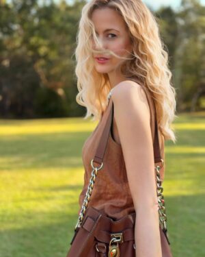 Rachael Carpani Instagram - When your mum lets you raid her handbags …..
☺️☺️☺️💛💛💛
*
*
After a Fabulous break from social media 🥳🙌 (highly recommended ❤️🥰!) 
*
Am jumping back on with an irrelevant Handbag post to lighten up the doom scroll 
(Then back to it 😉)
*
We all know what is happening in the world right now….and we should keep speaking up / donating , no child ANYWHERE should be going through this . 

You can Head to many organisations, @doctorswithoutborders
 @wckitchen 
@unicefaustralia ….and in no way will I stop posting about these horrific events . And our governments inaction.
*
But it’s still ok to take a break , look after your physical and mental health , you can’t help anyone unless you are okay 💛💛💛
Hope everyone happy , safe and looking after each other 🥰 
😘😘😘.…