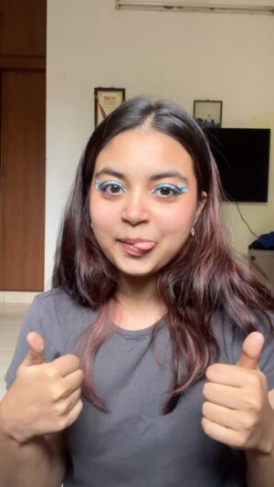 Sameeha Mariam Instagram - inspired by the one and only @sourandnasty (a legend) 
but honestly i can’t believe i managed to do this
blue kajal from @myzudio 
both blue liners and white liner from @maybelline (maybelline tattoo liner play)
@officialswissbeauty holographic liner i used as kajal 
blush and lipgloss is a project im working on 😋