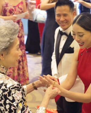 Sarah Lian Instagram - It ain’t a Chinese wedding without some 🍵. 

I was already emotionally spent from my exchange of vows that I didn’t realise I’d be tearing up during the tea ceremony. My village of a family has helped raise me since my return to Malaysia and serving tea was the least I could do for all they have done for me. It felt like such an honour to have them celebrate with me. My sister has been in the trenches with me and I just lost it when she said she’d always be there for me. 🥹

My new family has welcomed me with open arms and they’ve already seen me cry like a goon, so it looks like we’re a lot closer now. 🙆🏻‍♀️

On a lighter and more sustainable note, I got to use my @khoonhooi_gold dress for a classic look and also borrowed some special wedding themed items from @itsjessicashen, which I’ve gladly “pay-it-forward” to the next bride-to-be. I bought my wedding coordinator’s unused teacup husks for the 80 cups of tea we needed to serve to our extended family. Plus, I asked our wedding decorators to reuse some of these items for our dinner reception to also minimise wastage. 

💄: @shengsaw 
💆🏻‍♀️: @mmavissang 
👗: @khoonhooi_official 
📷: @jonlowstudios 
📹: @filmsbykoh 
🎋: @paxfloralstudio 

#theTingTengs