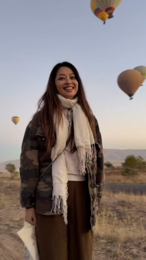 Sarah Lian Instagram - For the longest time, I dreamed of floating high above Cappadocia in a hot air balloon. It was just a small picture on my vision board, a wish I wasn’t sure would ever come true.

But as we lifted off, with my husband holding me close from behind, there was a quiet, perfect moment where I felt the Universe had been listening all along. 

In that moment, I knew that all the doors I’d struggled to keep open were meant to be closed, and all the questions I’d carried with me, finally found their answers.

This was everything I dreamt it to be. ❤️

#cappadocia  #hotairballoon #türkiye
