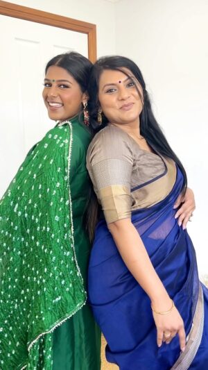 Swarnaa Rajalingam Instagram - Had no idea what to gift my husband for his birthday so flew one of his sisters down for some quality time in Sydney (missed the rest of the fam ❤️). Convinced @sivaprasha akka to be in a cheeky little transition with me before we headed to the temple!  If you guys want to see the actual surprise video comment below (gotta convince my husband to let me show u guys 🤭).

My outfit: gifted by akka from @spicedelegance 
My jewellery: @jodi.box 🥰

@sivaprasha Akka’s saree @kungumum 
@sivaprasha jewellery: @jodi.box 

[sisters, saree transition, tamil girls, south Asian fashion]