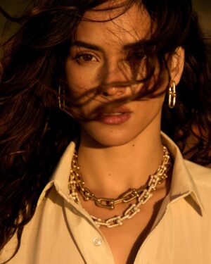 Adria Arjona Instagram - Where we spend the holidays may change, but I can always bring a piece of @TiffanyAndCo with me wherever I go. #ATiffanyHoliday
