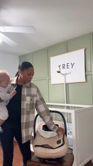 Allyson Felix Instagram - The Deluxe Carrier Cover I created with @goldbuginc has been such a lifesaver this winter—Trey stays warm and cozy, and I love how practical and stylish it is. ❄️ It’s a great gift idea for parents who are always on the go! 

Use code AFHoliday25 for 25% off at goldbug.com (valid through 12/31/24–link in @goldbuginc bio). ✨Happy Holidays!