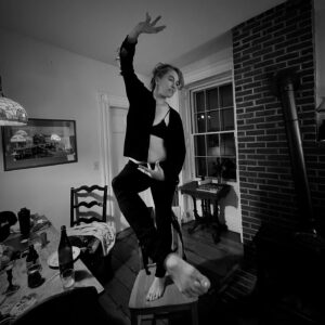 Amanda Palmer Instagram - Okay….stay with me to the end here, it’s worth it I promise, I promise 

So, our British Auntie Rebecca was visiting. 

She’s in her late sixties and hails from a remote part of the UK.

She’s been one of my favorite houseguests ever; pottering around, making origami for the kids, doing all the dishes, brushing Ash’s hair and tutting him, being very awesome and Mary Poppins-y.

She came armed with this navy button-up sweater all riddled with holes in the arms and everywhere that she wore pretty much every day.

She called it her “Cardy”, short for Cardigan, which is a British way of saying sweater.

So anyway, Rebecca finally left for the airport to head back to Old Blighty, and a few hours after she departed, I found the Cardigan left behind on a chair-back in our kitchen. 

Oh my god! HER BELOVED CARDY. Did she leave it on purpose? As an act of permanence? Territory? Love? (If so, I was happy). 

So we who were left in America all took turns putting it on and taking dumb photos and then we sent her a little photoset of us all in the kitchen with Cardy.

That was when Brendon got the idea. 

The idea was that we should find her a really nice replacement sweater, and mail it to her in the UK, and then she would have a new beloved Cardy, and we would keep the old hole-riddled one here, in a box, for when she visits next year, and we could name the old sweater Cardy A, so that the new one would be dubbed…

Yes.

Cardy B.

Thank you good night

(blame Brendon)