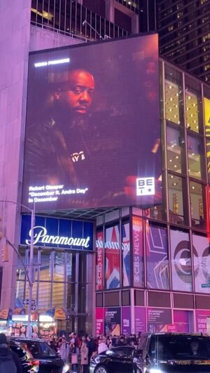Andra Day Instagram - It’s a Bird. It’s a Plane. NO WAIT!!! It’s my Christmas video ‘December’ featuring my sis @andradaymusic !

 Thanks to @bet for the billboard premiere in Times Square!! Go watch the full video NOW at the link in bio!!!