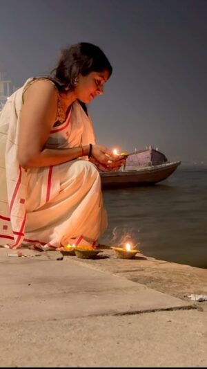 Anumol Instagram - Lighting a diya on the Ganga—a spark of inner hope and a moment of deep connection with the universe. As the flame dances on the water, it carries my prayers and gratitude into the infinite — someone said lighting diyas is to honor loved ones who have passed away. I hope my loved ones will also be watching me happily from heaven 🙏