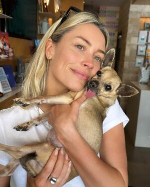 Arielle Vandenberg Instagram - My tiny Best Friend. Our Angel went to Heaven. 🕊️I don’t even know where to start and can’t believe I’m typing this. This is so painful. But I’ll start with the important stuff - I know she is running around Heaven with her new legs! I know she’s in Jesus‘s lap. I know she’s with my grandparents! I know they’re holding her and kissing her the way I would. I know she’s playing with her first owner and even her doggy parents! These thoughts bring me so much comfort and joy.  Stinky, you changed my life. You legit turned me into a mom.  I’ve never loved a dog like this before. Matt and I were truly so lucky.
You brought me so much joy! You could make me laugh like nothing else.  I have your little fleece sweater here that I’ve been pushing against my face, smelling it and using it to wipe my tears. This little sweater reminds me how tiny you were. I can’t believe such a magical energy could fit in something so tiny. The energy that you brought to this world was like no other. Your gift was initiating smiles in anyone that saw you. EVERYONE loved you. I loved carrying you around and intentionally putting you next to people that I felt needed a little joy in their life. 🥹 You turned Matt into a little dog loving softy. He has always been a gentle caring man but now he was your dad! He took such good care of you. All the way down to warming your paws after bringing you in from the wet grass. 😭 🐾 Stinky, thank you for your endless love. Thank you for staring at me 24/7. Thank you for always wondering where I was. Thank you for always finding me. Thank you for being such a good girl. 
As hard as this is I don’t like calling this a loss. Because it’s a major gain in the spiritual realm. Her beautiful spirit and delicate yet resilient soul will be dancing around forever! I don’t feel like I lost you. I truly feel like you’re right here next to me. You will always be a part of me. I will miss and love you forever and ever and ever my sweetest girl!🥹❤️ See you in my dreams Ticket!