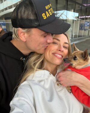 Arielle Vandenberg Instagram - My tiny Best Friend. Our Angel went to Heaven. 🕊️I don’t even know where to start and can’t believe I’m typing this. This is so painful. But I’ll start with the important stuff - I know she is running around Heaven with her new legs! I know she’s in Jesus‘s lap. I know she’s with my grandparents! I know they’re holding her and kissing her the way I would. I know she’s playing with her first owner and even her doggy parents! These thoughts bring me so much comfort and joy.  Stinky, you changed my life. You legit turned me into a mom.  I’ve never loved a dog like this before. Matt and I were truly so lucky.
You brought me so much joy! You could make me laugh like nothing else.  I have your little fleece sweater here that I’ve been pushing against my face, smelling it and using it to wipe my tears. This little sweater reminds me how tiny you were. I can’t believe such a magical energy could fit in something so tiny. The energy that you brought to this world was like no other. Your gift was initiating smiles in anyone that saw you. EVERYONE loved you. I loved carrying you around and intentionally putting you next to people that I felt needed a little joy in their life. 🥹 You turned Matt into a little dog loving softy. He has always been a gentle caring man but now he was your dad! He took such good care of you. All the way down to warming your paws after bringing you in from the wet grass. 😭 🐾 Stinky, thank you for your endless love. Thank you for staring at me 24/7. Thank you for always wondering where I was. Thank you for always finding me. Thank you for being such a good girl. 
As hard as this is I don’t like calling this a loss. Because it’s a major gain in the spiritual realm. Her beautiful spirit and delicate yet resilient soul will be dancing around forever! I don’t feel like I lost you. I truly feel like you’re right here next to me. You will always be a part of me. I will miss and love you forever and ever and ever my sweetest girl!🥹❤️ See you in my dreams Ticket!