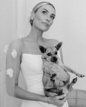 Arielle Vandenberg Instagram - My tiny Best Friend. Our Angel went to Heaven. 🕊️I don’t even know where to start and can’t believe I’m typing this. This is so painful. But I’ll start with the important stuff - I know she is running around Heaven with her new legs! I know she’s in Jesus‘s lap. I know she’s with my grandparents! I know they’re holding her and kissing her the way I would. I know she’s playing with her first owner and even her doggy parents! These thoughts bring me so much comfort and joy.  Stinky, you changed my life. You legit turned me into a mom.  I’ve never loved a dog like this before. Matt and I were truly so lucky.
You brought me so much joy! You could make me laugh like nothing else.  I have your little fleece sweater here that I’ve been pushing against my face, smelling it and using it to wipe my tears. This little sweater reminds me how tiny you were. I can’t believe such a magical energy could fit in something so tiny. The energy that you brought to this world was like no other. Your gift was initiating smiles in anyone that saw you. EVERYONE loved you. I loved carrying you around and intentionally putting you next to people that I felt needed a little joy in their life. 🥹 You turned Matt into a little dog loving softy. He has always been a gentle caring man but now he was your dad! He took such good care of you. All the way down to warming your paws after bringing you in from the wet grass. 😭 🐾 Stinky, thank you for your endless love. Thank you for staring at me 24/7. Thank you for always wondering where I was. Thank you for always finding me. Thank you for being such a good girl. 
As hard as this is I don’t like calling this a loss. Because it’s a major gain in the spiritual realm. Her beautiful spirit and delicate yet resilient soul will be dancing around forever! I don’t feel like I lost you. I truly feel like you’re right here next to me. You will always be a part of me. I will miss and love you forever and ever and ever my sweetest girl!🥹❤️ See you in my dreams Ticket!