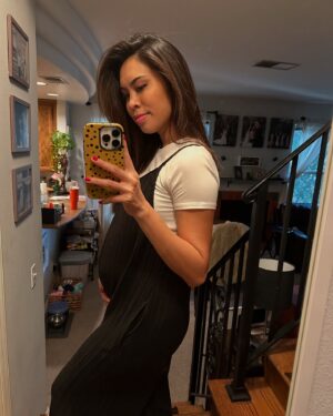 Ashley Argota Instagram - 2024. What a year. There have been so many highlights this year. But here’s what it really looked like. :) My pregnancy was so hard. I was so sick all the time and the meds I took to help with it made me tired. I threw up so hard sometimes that I blew blood vessels in my eyes. Actually giving birth to Michael might have been the easiest part of it all 😂 we wrote our second screenplay during this pregnancy and I’ve spent the first months of Michael’s life producing and getting ready to act in it. I’ve had a goal since I was 15 to be working on a set at least once a year. This is the first year I haven’t achieved that goal. That’s been hard. Feeding my son has been amazing. But pumping and feeding have also been hard on my body. And my god the body changes!! It has been difficult to look and feel like myself. I am still trying to find it. 

But so many good things also happened. We are making our first Mismo movie. That’s been so exciting. Watching our son discover the world has made my heart burst every day. And watching the love of my life become a father has been the greatest gift. This year was hard but my goodness it was fulfilling and amazing in so many ways. I’ll find myself again eventually. In the meantime, I’ll be over here working hard AF while also snuggling my boys and my sweet pup. Thank you, 2024. 🖤

Also side note if you’ve made it this far— as a member of the itty bitty titty committee I have spent this year learning what it’s like to have boobs! Omg!!!!!! What a difference!!!! Lolololol