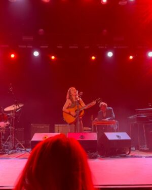 Ashley Williams Instagram - If you knew me in the 90s, you knew me as an Ani DiFranco obsessed, grunge devoted, wildly liberal creative with hard edges and a soft center. One of my big final  presentations in college was to act out the entire “life cycle“ of Ani DiFranco, including acting out her birth as a baby— crying and all. 😂😂 I WAS SO HARDCORE. It still makes me laugh when I think about it in hindsight. 

I didn’t just go to her concerts, I showed up six hours early to catch a glimpse of her meditating in a meadow nearby, was first in line to stand in general admission, and then hid in the bushes next to her tour bus to catch a glimpse of her at the end of the night. She was the first character I ever fully studied. I used her lyrics like a map to unlock her history and how her entirely complicated brain worked. Her albums were the soundtrack of my coming of age. 

She taught me how to talk to people who condescend to me. She taught me to invest in women— That competition would get us nowhere, but coffee, authenticity and giggles would get us everywhere. She was right. 

Also if you know me and my loved ones now, you know that the last few weeks of our lives has been hell on our hearts. My thoughtful husband surprised me last night with something I did not know I needed: I got to revisit myself in my 20s. Good news: She’s still there. Full of hope, strength, and most importantly curiosity. Giggles were in there somewhere too— we’re working on it. 

Ani, you’ll never read this because you’re so cool, and even if you do, you’ll never fully understand how you made me who I am cuz it’s just too much, but oh boy am I just as grateful as I always have been. Thank you for letting me celebrate you and me and all of us, including firefighters, last night. As always, what doesn’t bend, breaks. Grateful for the sway. @anidifranco #ani #music #whatdoesntbendbreaks #firefighters #anidifranco