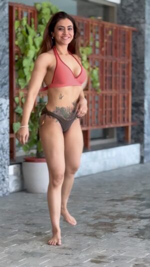 Balreet Mann Instagram - Walking into life with confidence, grace, and a whole lot of fire. 🌊✨ Feeling bold, sexy, and unstoppable. 💃 

#ConfidentlyMe #LivingMyBestLife #poolvibes💙🏊🏼‍♀️🌞 #mommylife #fitmommyinprogress #lifestyle #orangebrown#balreetmann #fitlit #gorgeousisnewcolor