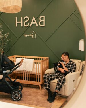 Brittney Griner Instagram - Bash may have the best room in the house. Thank you @strolleria for providing the most comfortable nursing chair and stroller. Relle and I both fall asleep with Bash at night in that chair and wake up without any aches and pains! That’s a plus in my book! @crateandkids proud to partner with you in designing Bash’s room! We love every detail from his amazing book wall collection to his comfortable crib! He sleeps like a big man in his room alone 💤 #strolleriapartner #crateandkidspartner #ilovemystrolleria #ilovemycrateandkids