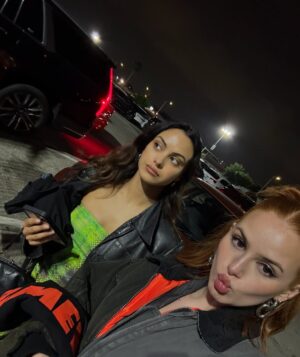 Camila Mendes Instagram - thanks for letting me relive my high school rave girl era 💚 @spotify @charli_xcx @troyesivan