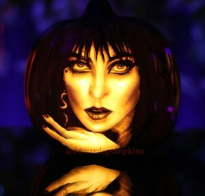 Cassandra Peterson Instagram - Happy Halloweekend! It’s #nationalpumpkinday 🎃🎃 Elvira pumpkin carvings by @jo3y3dwards