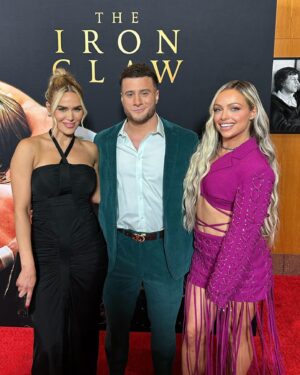 Catherine Joy Perry Instagram - Swipe to see some of your favorite @aew & @wwe #wrestling stars at the @ironclawmovie @a24 movie premiere last night. Incredible #film and In theaters 12/22

#hair @hayleyheckmann 
#glam @karinamorxoxo 
#dress @ysl
#stylist @mimicuttrell