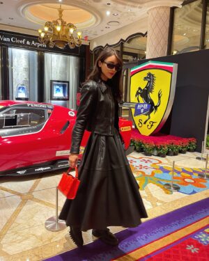 Caylee Cowan Instagram - Thank you @ferrari for an amazing night at the F1 Las Vegas Grand Prix wearing Ferrari from head to toe ❤️‍🔥 @ferraristyle 

Staying with the @wynnlasvegas 
@maisonwynn #maisonwynn 

📸: @gustave_durin 

 #ferrari #f1lasvegas 
#LasVegasGP
@f1lasvegas
@vegas