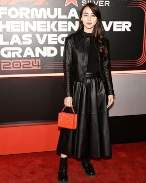 Caylee Cowan Instagram - Thank you @ferrari for an amazing night at the F1 Las Vegas Grand Prix wearing Ferrari from head to toe ❤️‍🔥 @ferraristyle 

Staying with the @wynnlasvegas 
@maisonwynn #maisonwynn 

📸: @gustave_durin 

 #ferrari #f1lasvegas 
#LasVegasGP
@f1lasvegas
@vegas