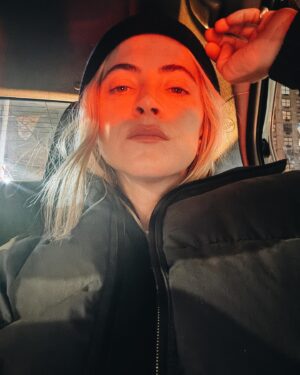 Emily Wickersham Instagram - ‘‘Tis the season for that big puffer time of year, early evening taxi lights and Cashy’s playlist